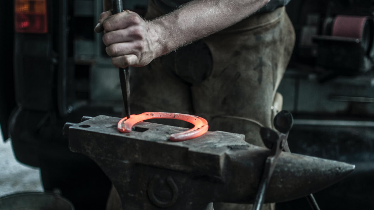 The origin of horseshoes as lucky charms (various theories)